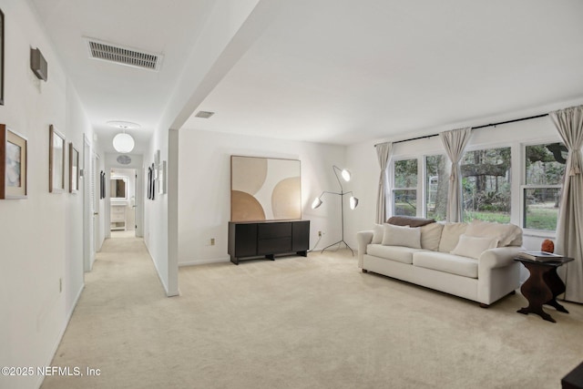 living room featuring light colored carpet