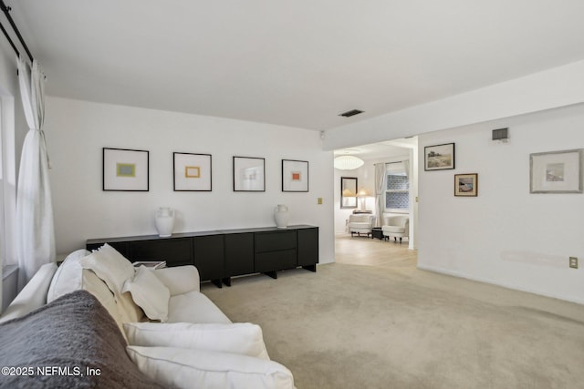 living room featuring light colored carpet