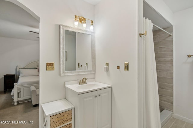 bathroom featuring vanity and a shower with shower curtain