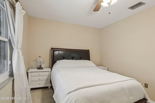 bedroom featuring ceiling fan and carpet flooring