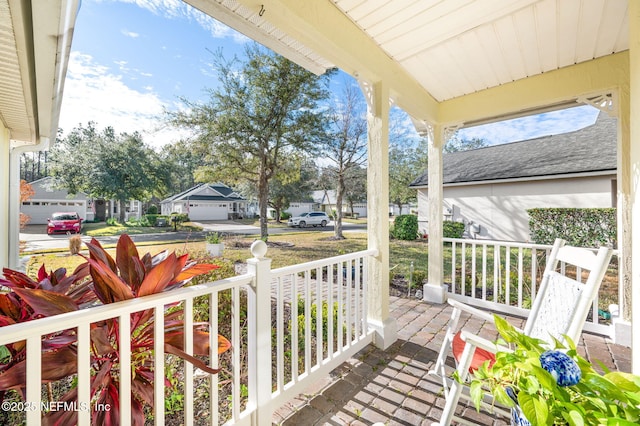 balcony featuring a porch