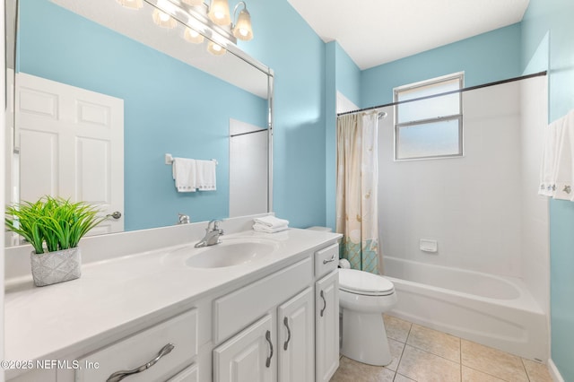 full bathroom with tile patterned flooring, vanity, shower / tub combo with curtain, and toilet