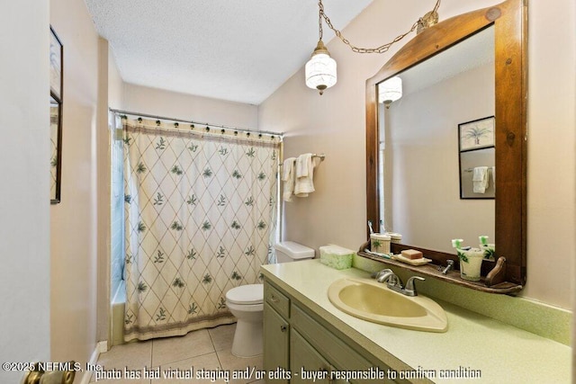 full bathroom with shower / bathtub combination with curtain, vanity, a textured ceiling, tile patterned floors, and toilet