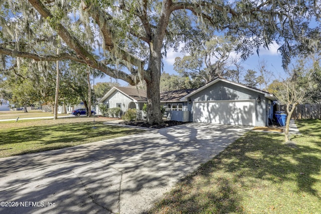 single story home with a garage and a front lawn