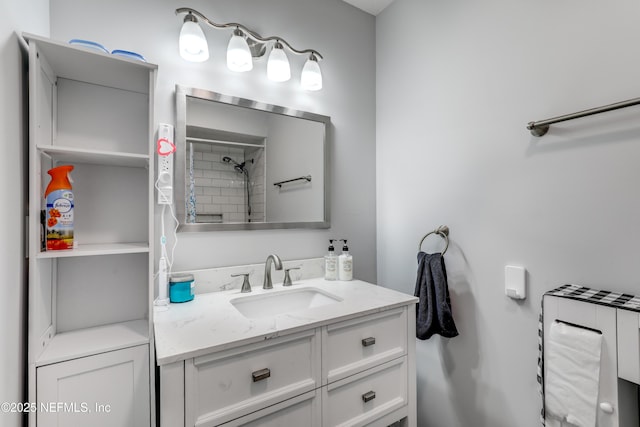 bathroom with vanity and walk in shower