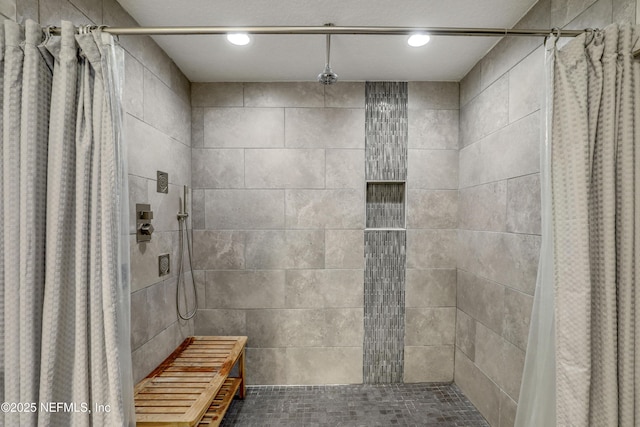 bathroom with a shower with curtain