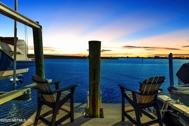 view of dock with a water view