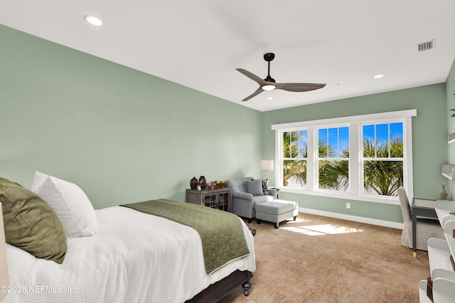 carpeted bedroom featuring ceiling fan