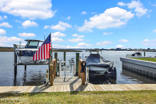 view of dock with a water view