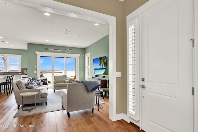 foyer with light hardwood / wood-style flooring