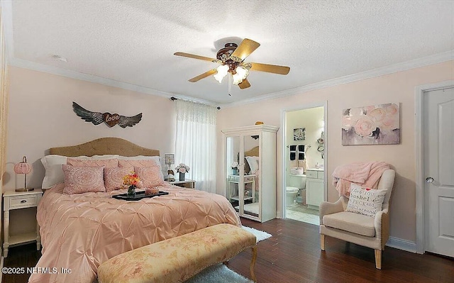 bedroom with crown molding, a textured ceiling, ceiling fan, and ensuite bathroom