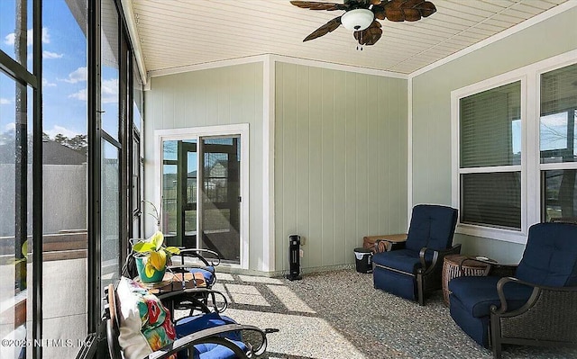 view of patio featuring ceiling fan