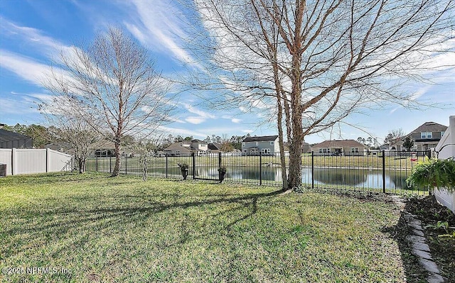 view of yard with a water view