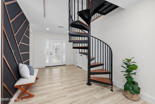 entrance foyer with light hardwood / wood-style floors