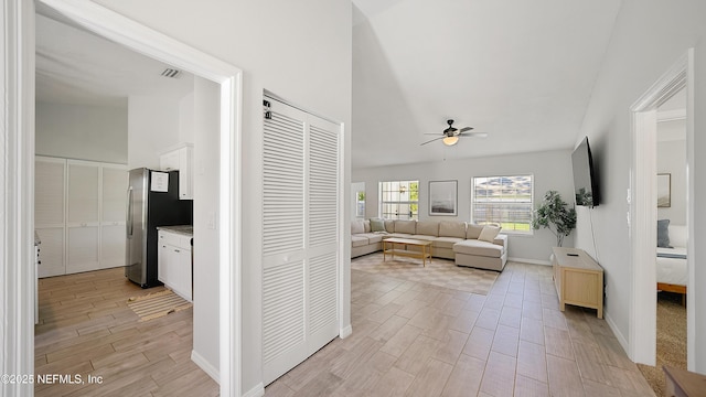 living room featuring ceiling fan