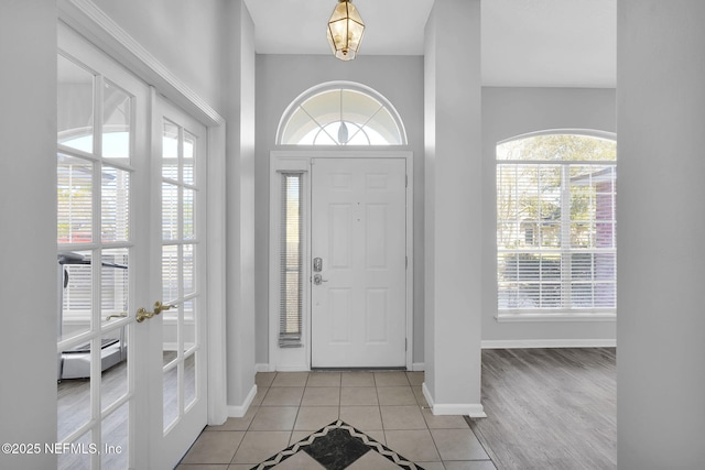 tiled entryway with french doors