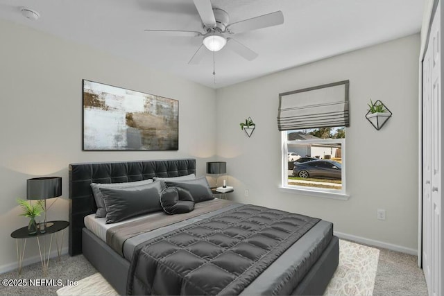 bedroom featuring carpet floors, a closet, and ceiling fan