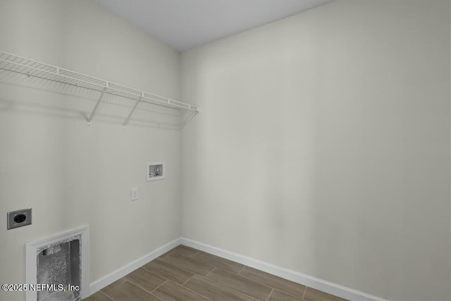 laundry area with washer hookup and hookup for an electric dryer