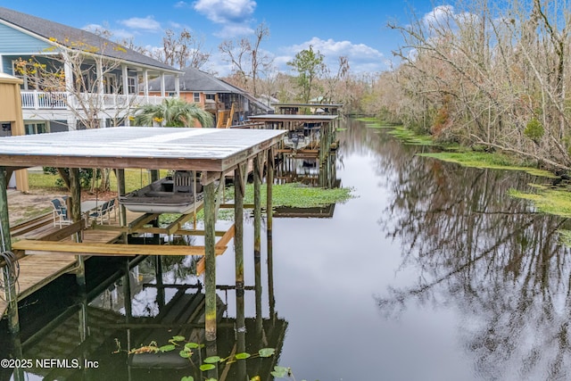 dock area with a water view