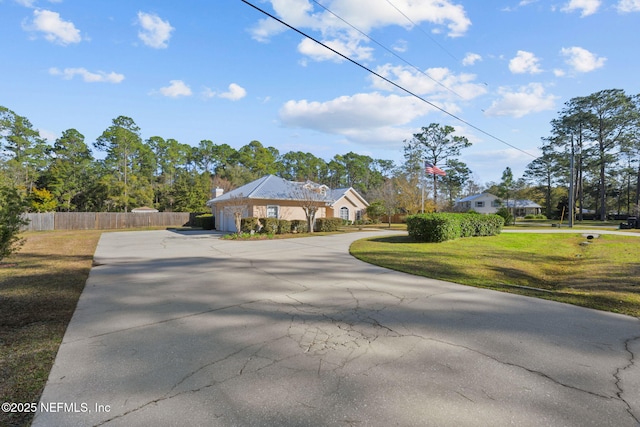 view of front of property with a front lawn