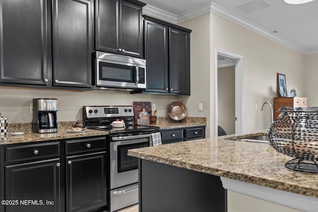 kitchen featuring sink, ornamental molding, light stone countertops, and appliances with stainless steel finishes