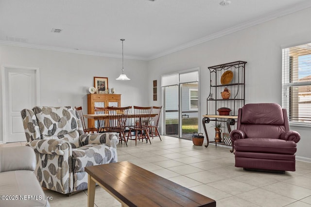 living room featuring crown molding and light tile patterned floors