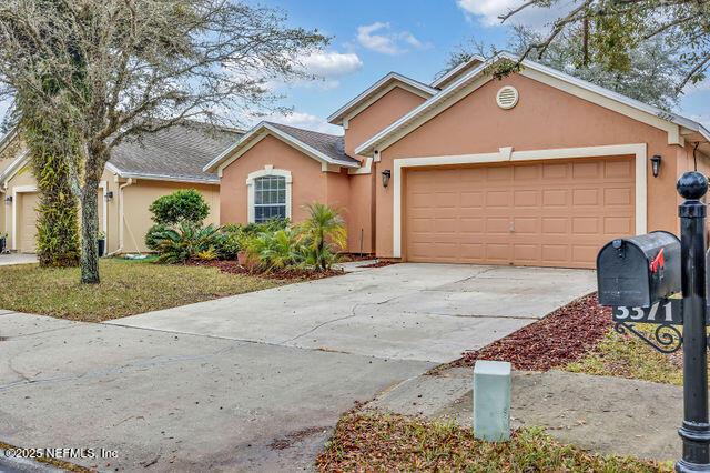 view of front of home with a garage