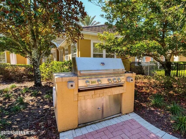 view of patio with a grill