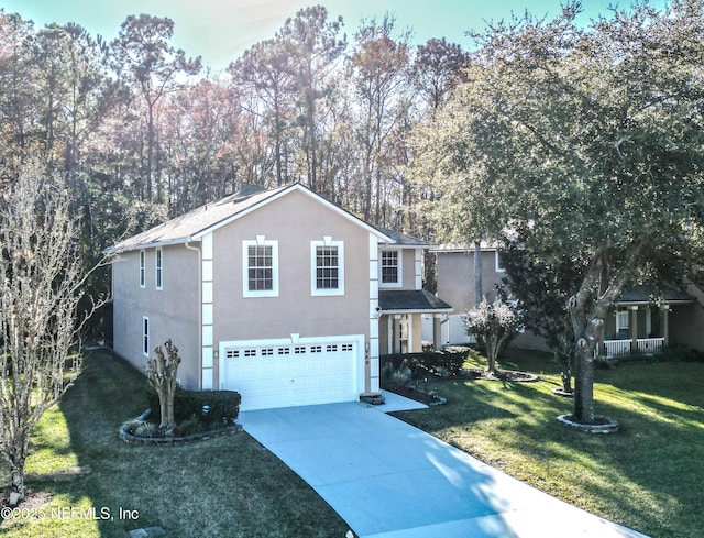 front facade with a garage and a front yard