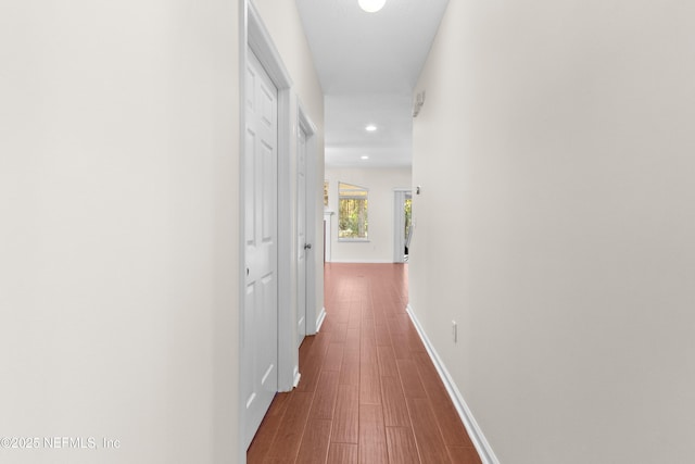 corridor featuring hardwood / wood-style flooring