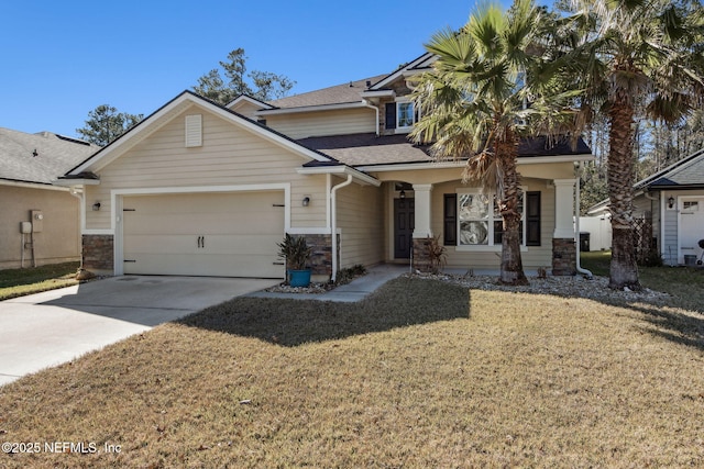 craftsman inspired home with a garage and a front lawn