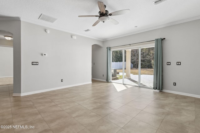 empty room with crown molding, ceiling fan, a textured ceiling, and light tile patterned floors