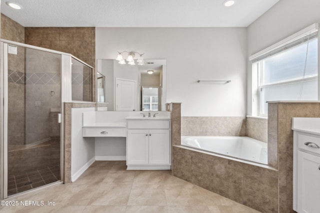 bathroom with independent shower and bath, vanity, and tile patterned flooring