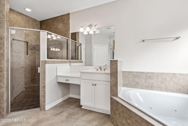 bathroom with independent shower and bath, vanity, tile patterned floors, and a textured ceiling