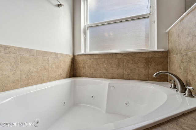 bathroom with a tub