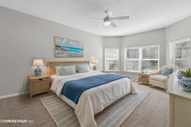 bedroom featuring light colored carpet and ceiling fan