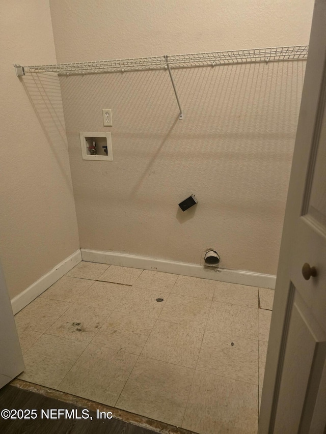 washroom with washer hookup and hookup for an electric dryer