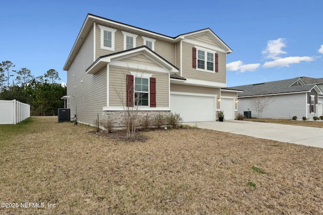 view of front of house featuring concrete driveway, an attached garage, fence, central AC, and a front yard