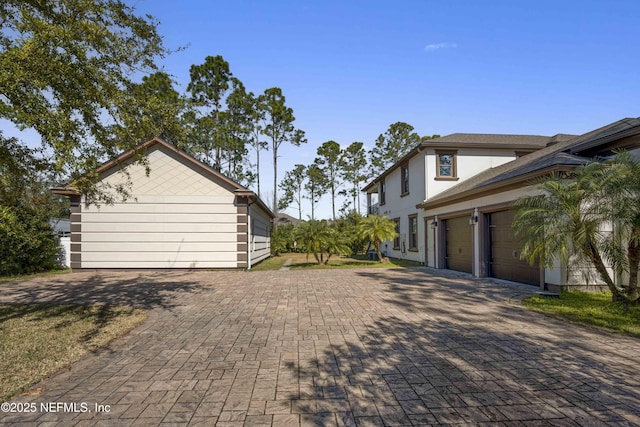 view of property exterior with a garage