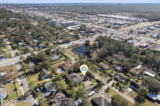 bird's eye view with a water view