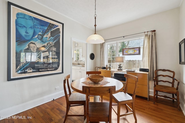 dining space featuring hardwood / wood-style flooring