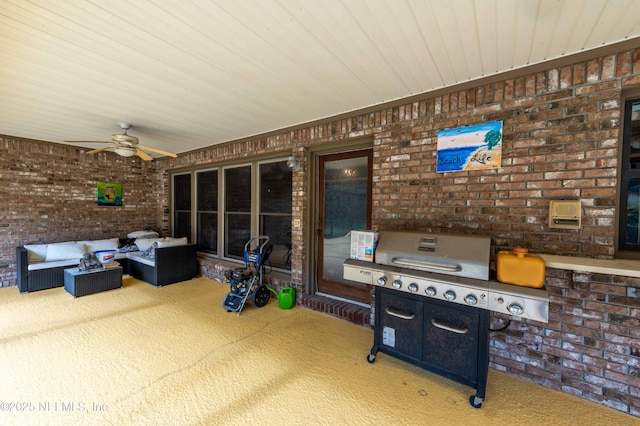 view of patio / terrace with ceiling fan and an outdoor living space