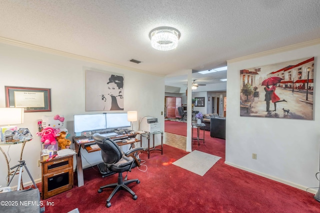 home office featuring ornamental molding, carpet flooring, ceiling fan, and a textured ceiling