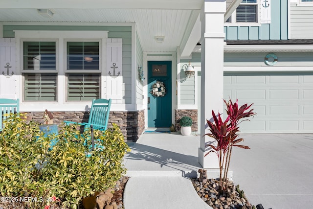 doorway to property featuring a garage