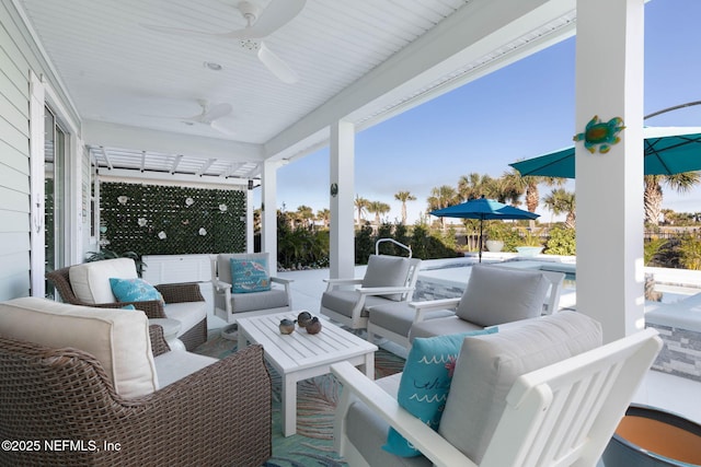 view of patio featuring an outdoor living space and ceiling fan