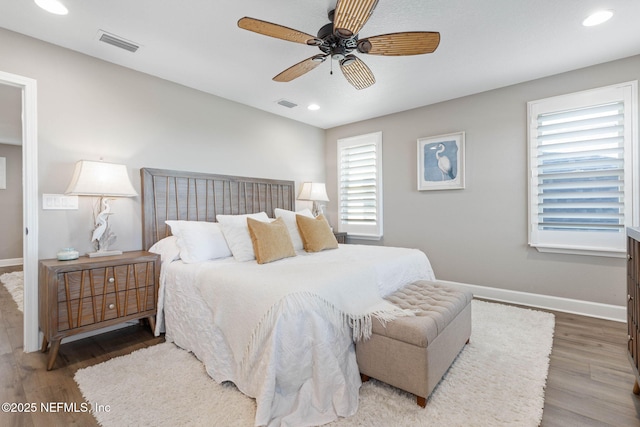 bedroom featuring ceiling fan and wood-type flooring