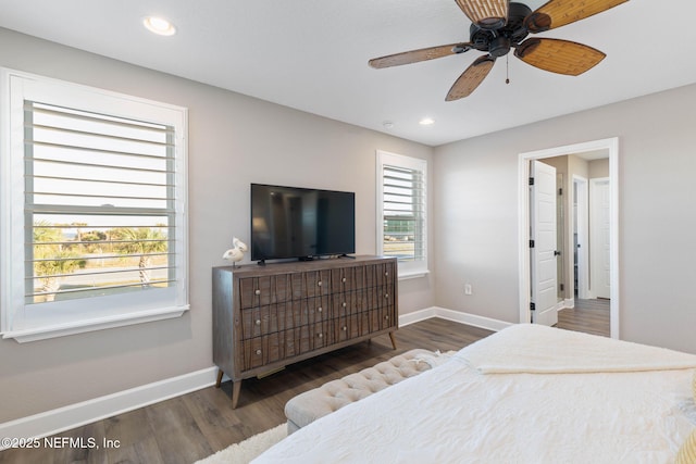 bedroom featuring dark wood-type flooring and ceiling fan