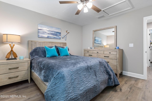 bedroom featuring ceiling fan and dark hardwood / wood-style floors