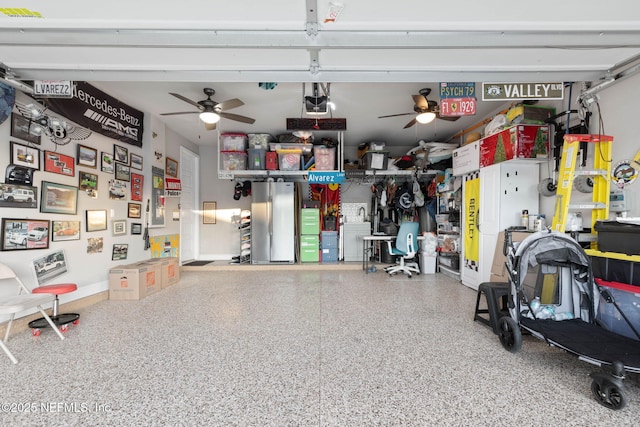 garage featuring a garage door opener and stainless steel fridge