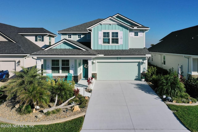 view of front of property featuring a garage